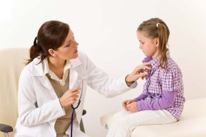 Women Doctor Conducting Health Check on Baby Girl - drmoirafitzpatrick